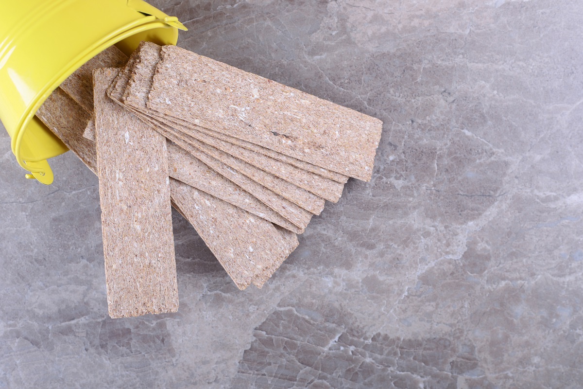 insulation material spilling out of a bucket